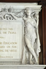 figure on library fireplace mantel