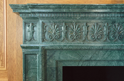 verde marble fireplace mantel detail