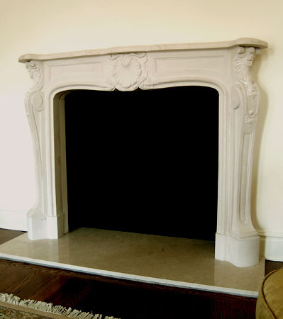 Limestone Louis XIV fireplace mantel