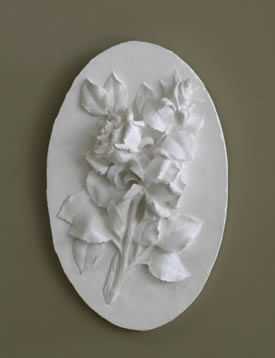 roses sculpted in clay and cast in stone